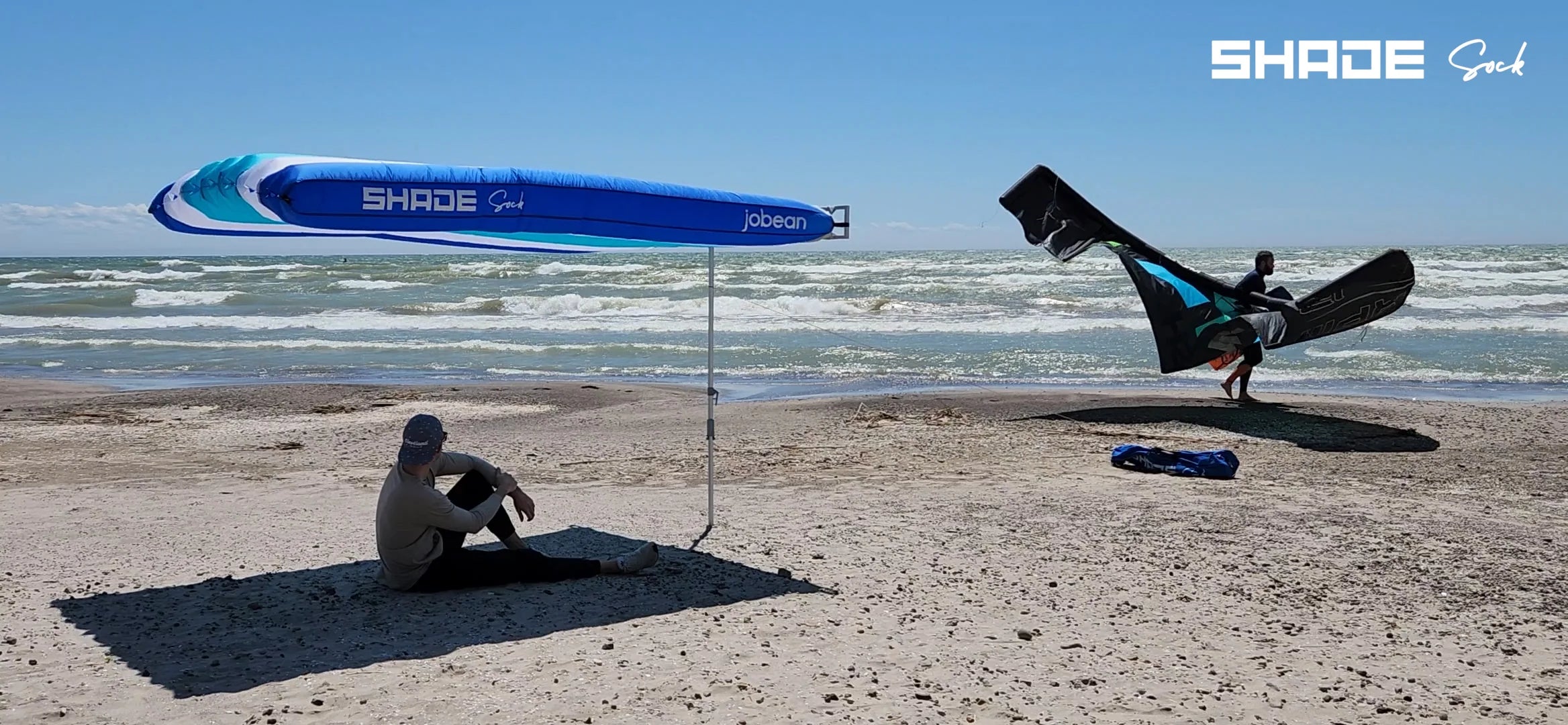 Load video: Setting up your Shade Sock in high wind, video guide on support